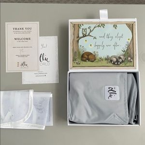 Brand new in box Ollie swaddle in gray!